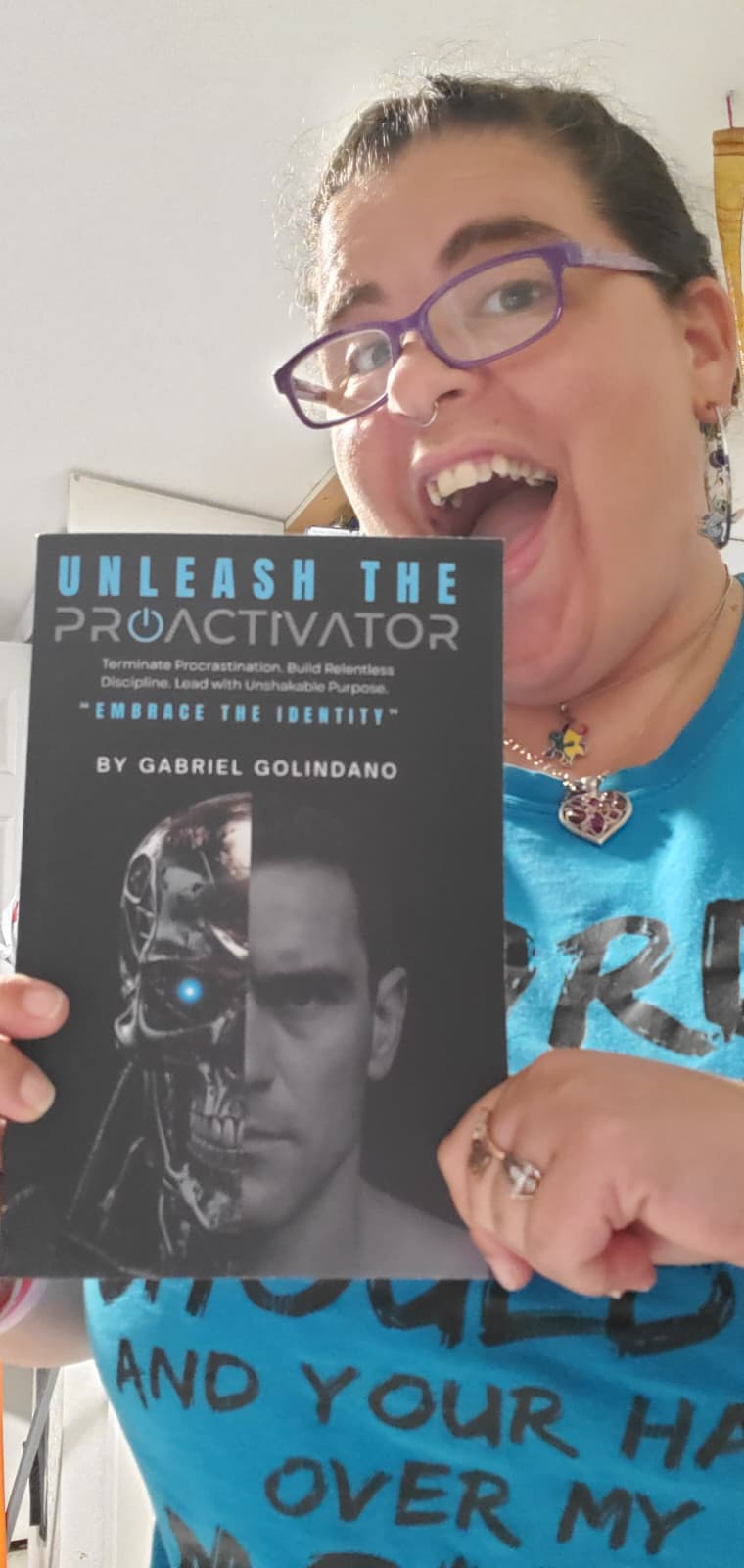 Reader with their copy of Unleash The ProActivator